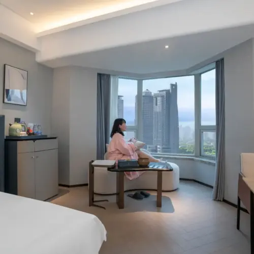 Big Bed Room With Night View On The Bund